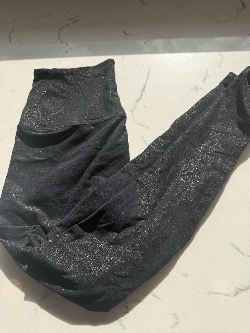 Beyond Yoga Black High-Rise Leggings with Gold Sparkle